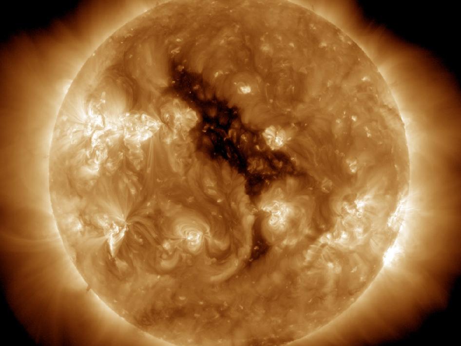 This image of a coronal hole on the sun bears a remarkable resemblance to the 'Sesame Street' character Big Bird. Coronal holes are regions where the sun's corona is dark. These features were discovered when X-ray telescopes were first flown above the Earth's atmosphere to reveal the structure of the corona across the solar disc. Coronal holes are associated with 'open' magnetic field lines and are often found at the sun’s poles. The high-speed solar wind is known to originate in coronal holes. The solar wind escaping from this hole will reach Earth around June 5-7, 2012. 