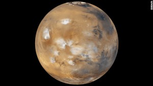 Water-ice clouds, polar ice and other geographic features can be seen in this full-disk image of Mars from 2011. NASA's Mars Curiosity Rover touched down on the planet on August 6. Take a look at stunning photographs of Mars over the years