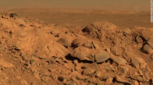 A rock outcrop dubbed Longhorn and the sweeping plains of the Gusev Crater are seen in a 2004 image taken by the Mars Exploration Rover Spirit.