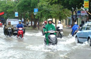 yes that's the road highway or freeway or interstate whatever you call it here in the USA  in Vietnam that's what happen when it rain their primitive sewer system cannot handle draining the water quick enough