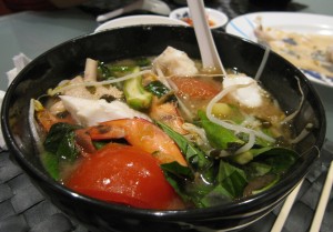 various dishes of canh chua vietnamese sour soup