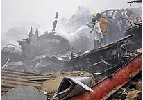 153 people were aboard a Dana Airlines passenger jet that crashed into a two-story building in Lagos, the country's largest city