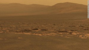 A portion of the west rim of the Endeavour Crater sweeps southward in this view from NASA's Mars Exploration Rover Opportunity in 2011. The crater is 22 kilometers (13.7 miles) across.