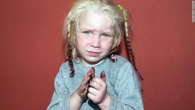 4 years old blonde blue eye found in Greece parents she's with were not her biological parents so where is her biological parents?